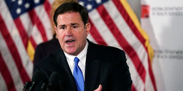 In this Dec. 2, 2020, file photo, Arizona Republican Gov. Doug Ducey answers a question during a news conference in Phoenix. (AP Photo/Ross D. Franklin, Pool, File)