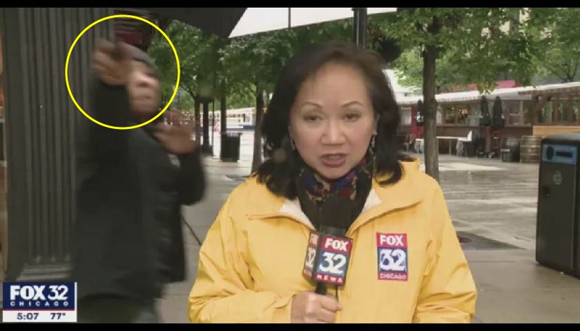 [VIDEO] Chicago Man Points Gun at Local News Crew During LIVE Story On City Violence