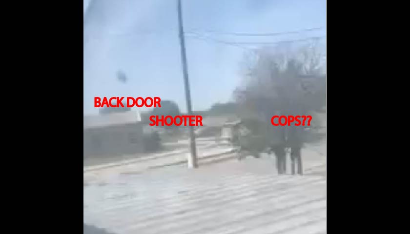 [VIDEO] Newly Uncovered Footage of Shooter at Backdoor of School Raises More Questions