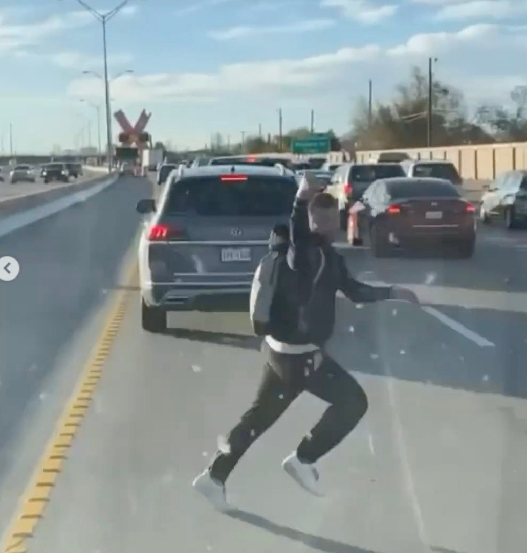 WATCH: Shocking Video Shows Illegals Easily Jumping Over Border Wall and Disappearing into Texas Traffic