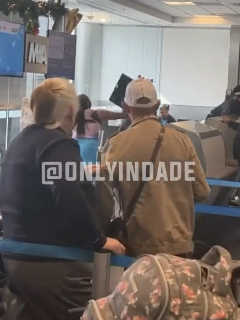Mother of two goes crazy at Miami airport.