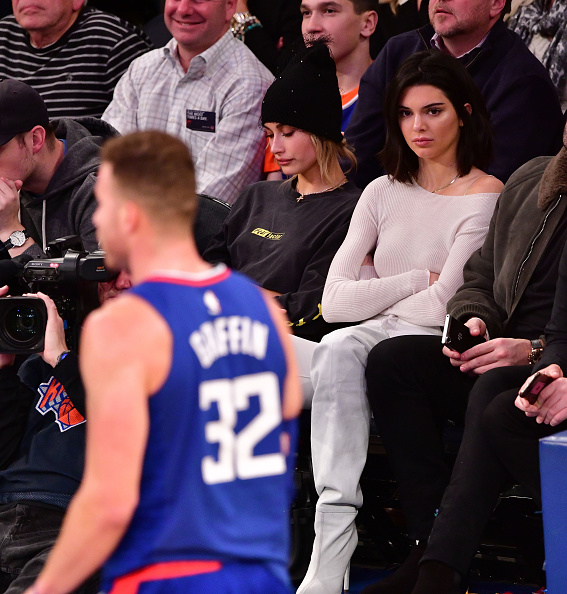 Kim Kardashian Trolls Kendall Jenner’s NBA Dating History With ‘Starting 5’ Shirt