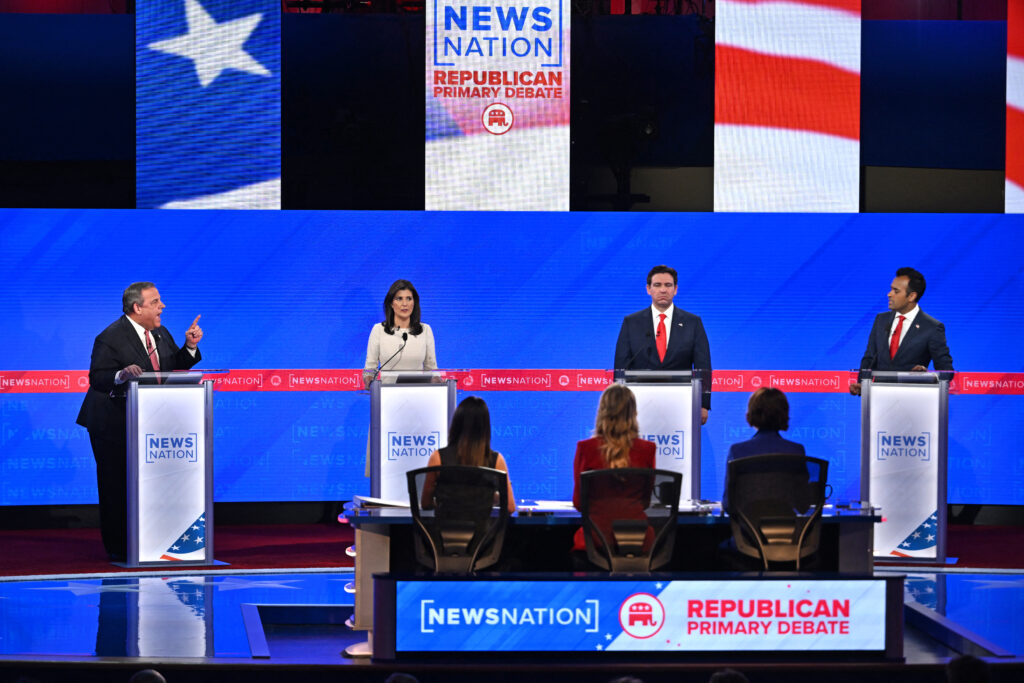 TOPSHOT - (From L) Former Governor of New Jersey Chris Christie, former Governor from South Carolina and UN ambassador Nikki Haley, Florida Governor Ron DeSantis and entrepreneur Vivek Ramaswamy participate in the fourth Republican presidential primary debate at the University of Alabama in Tuscaloosa, Alabama, on December 6, 2023. (Photo by Jim WATSON / AFP) (Photo by JIM WATSON/AFP via Getty Images)